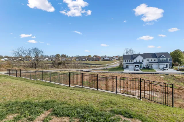 a view of a lake with a big yard