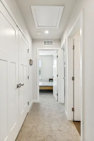 a view of room with walk in closet and window