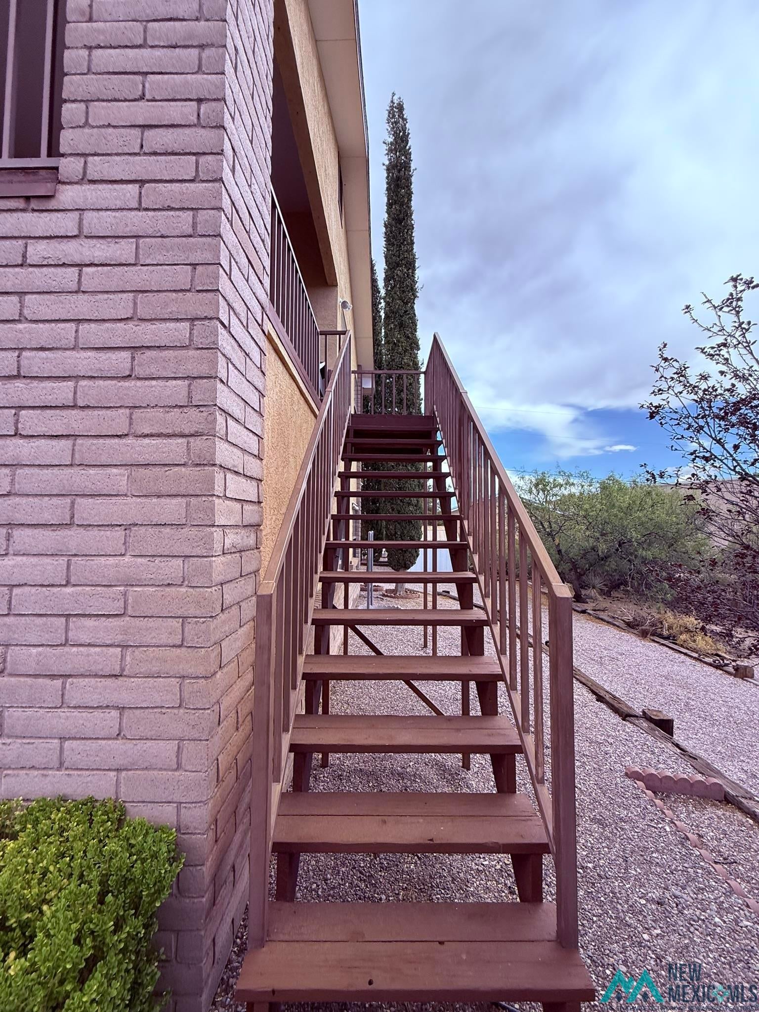 300 Rio Grande Circle Elephant Butte, NM 87935 - Photo 88 of 99 Exterior staircase with wood steps and metal railings