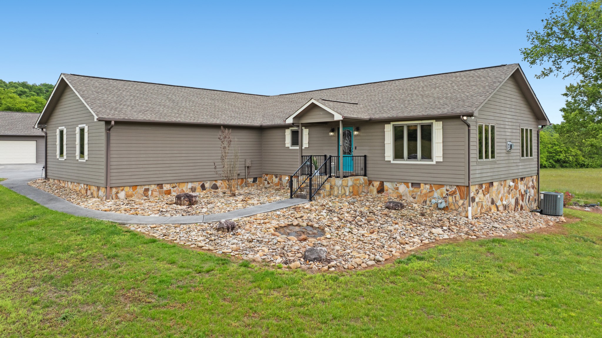 6052 Morganton Road Greenback, TN 37742 - Photo 1 of 54 a front view of a house with a yard