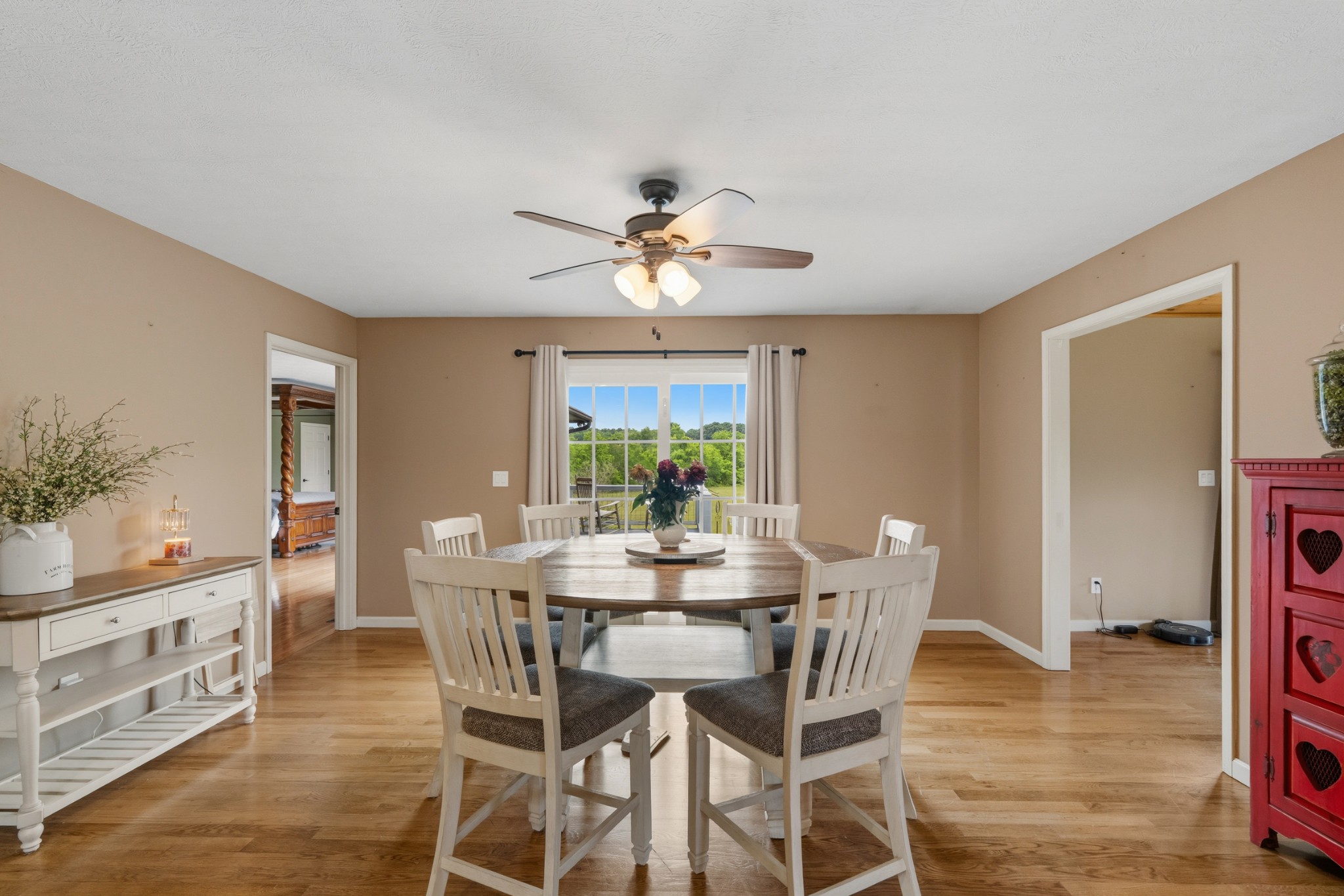 6052 Morganton Road Greenback, TN 37742 - Photo 11 of 54 a view of a dining room with furniture window and wooden floor