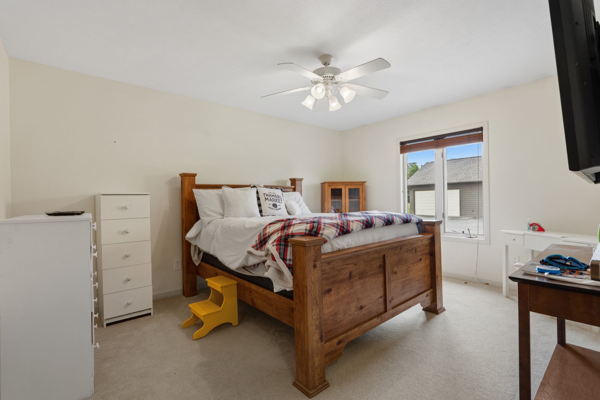 6052 Morganton Road Greenback, TN 37742 - Photo 24 of 54 a bed room with a bed and a chandelier