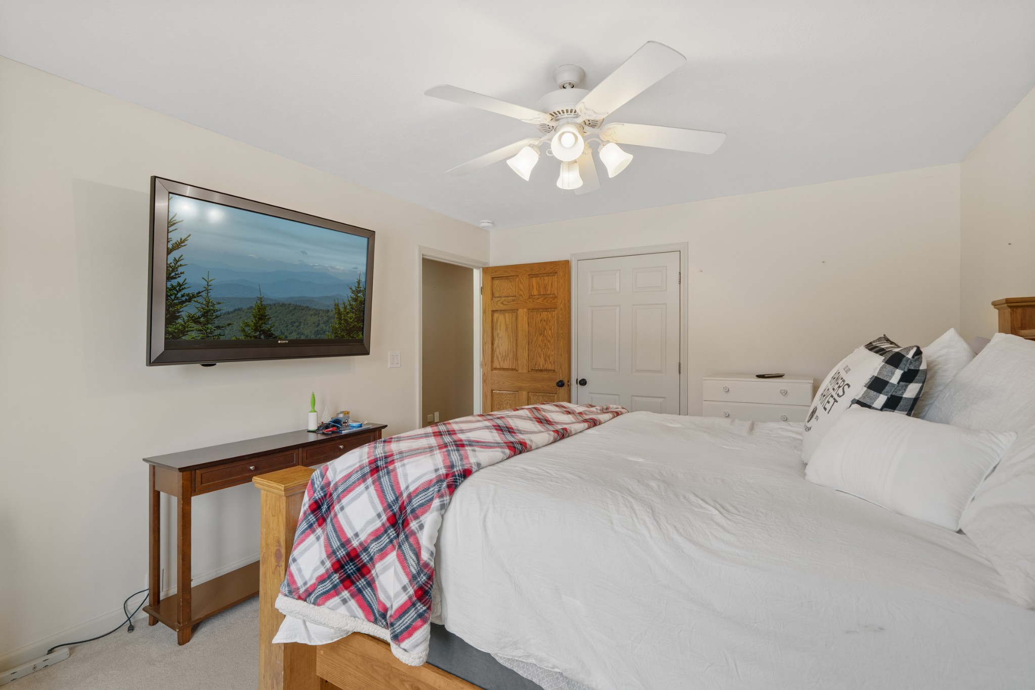6052 Morganton Road Greenback, TN 37742 - Photo 25 of 54 a bedroom with a bed and a flat screen tv