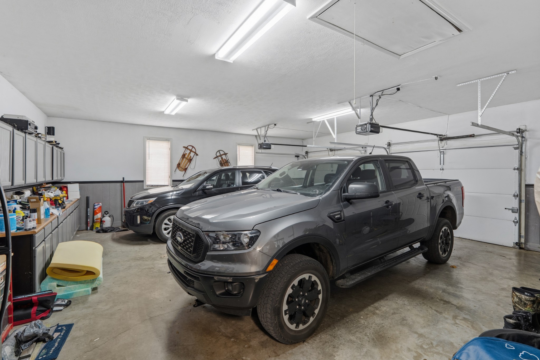 6052 Morganton Road Greenback, TN 37742 - Photo 27 of 54 a car that is parked in a garage