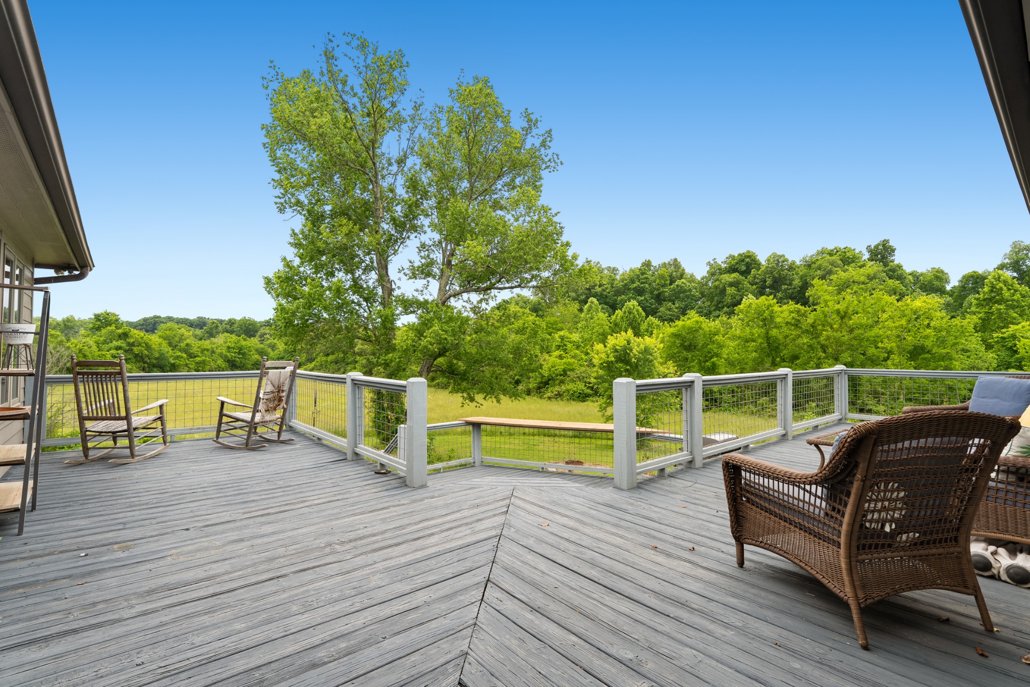6052 Morganton Road Greenback, TN 37742 - Photo 29 of 54 a view of a balcony with two chairs and a table