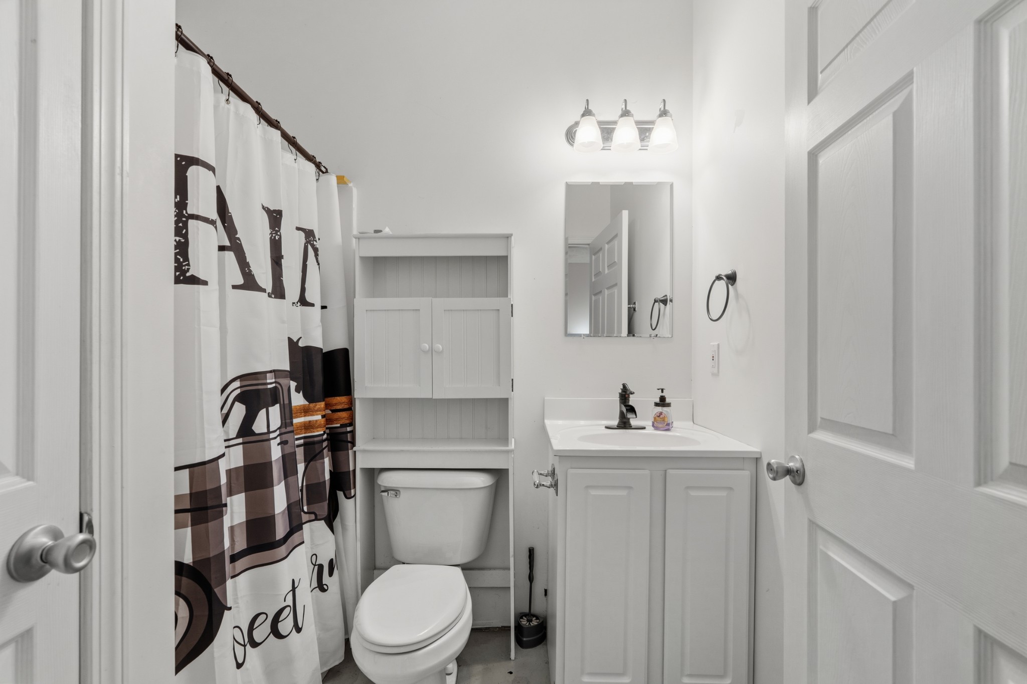 6052 Morganton Road Greenback, TN 37742 - Photo 37 of 54 a bathroom with a sink a toilet and shower