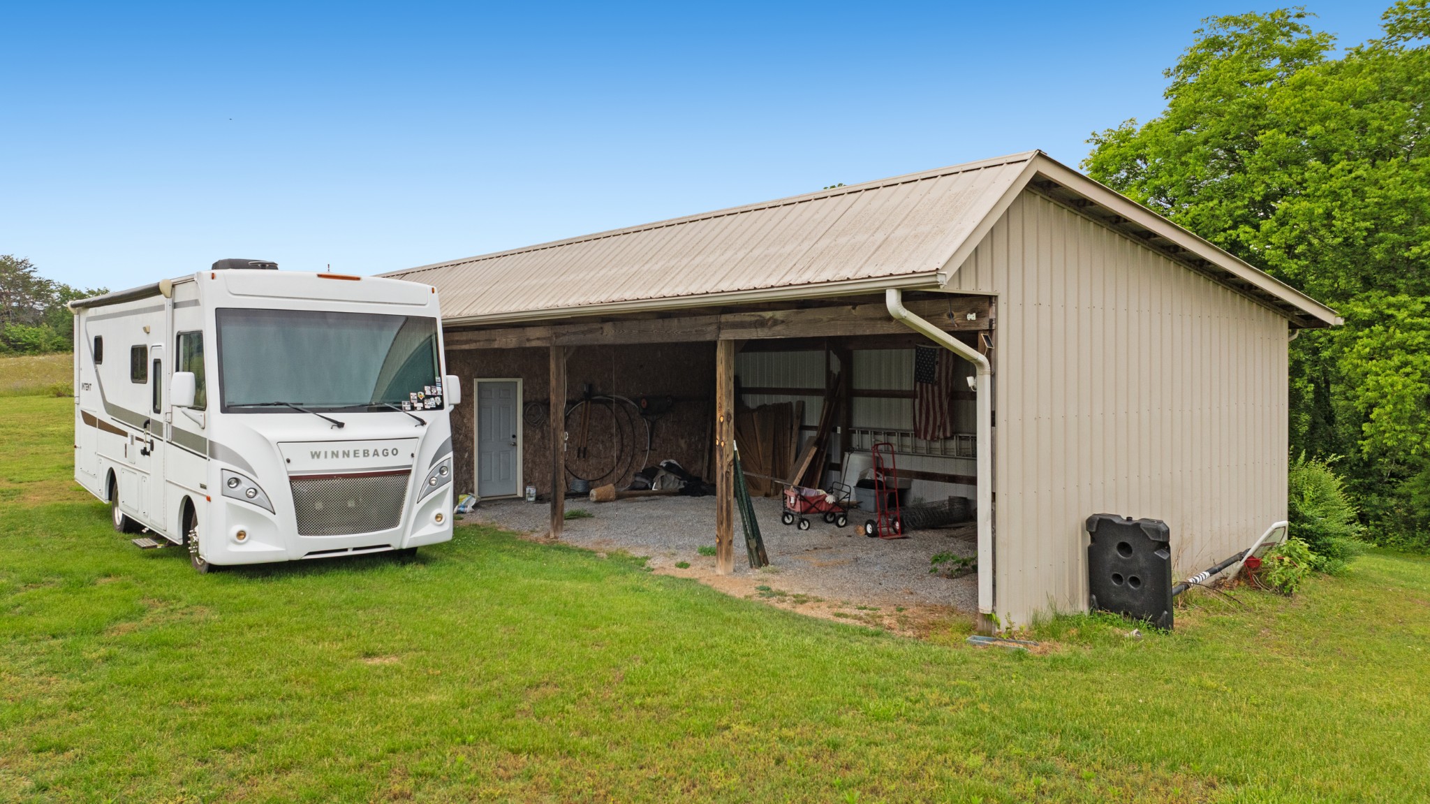 6052 Morganton Road Greenback, TN 37742 - Photo 4 of 54 a house view with a garden space