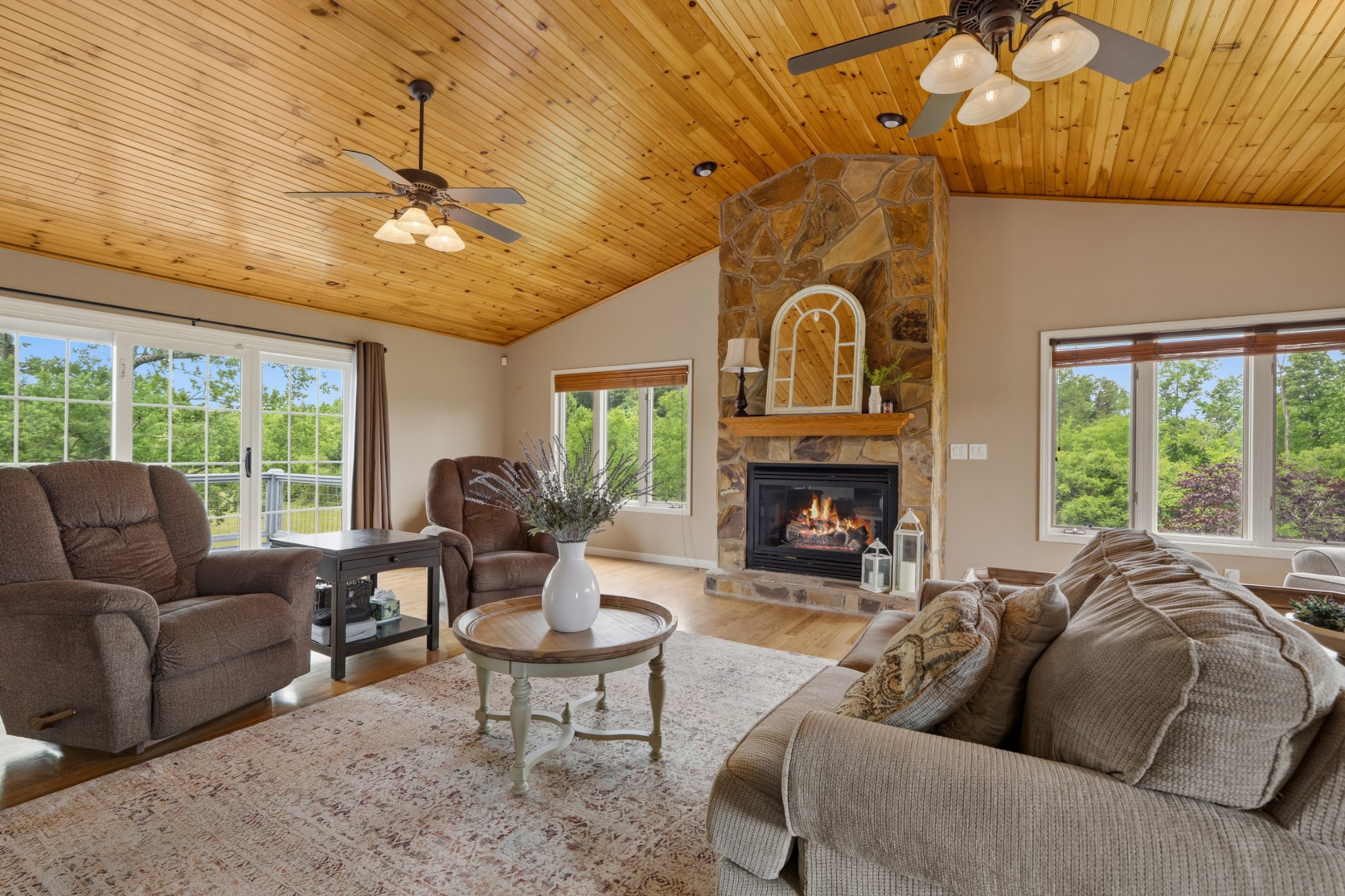 6052 Morganton Road Greenback, TN 37742 - Photo 8 of 54 a living room with furniture a fireplace and a floor to ceiling window