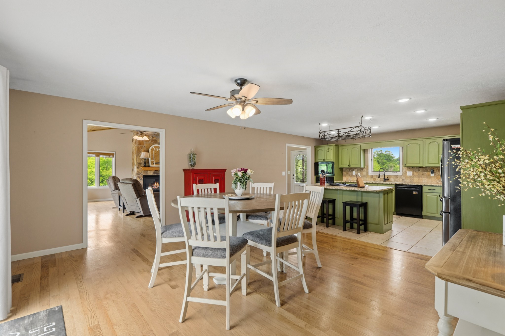 6052 Morganton Road Greenback, TN 37742 - Photo 9 of 54 a view of a dining room with furniture and a chandelier
