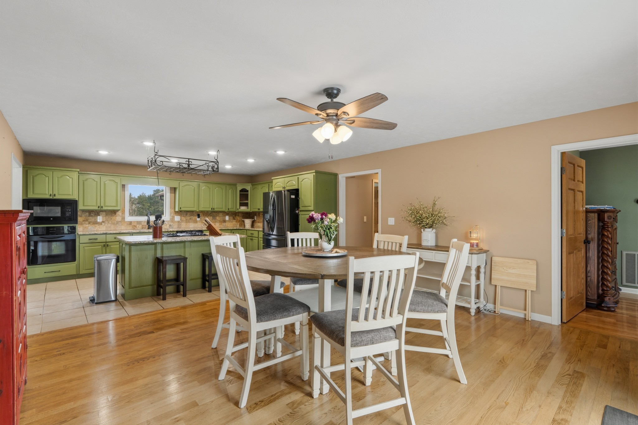 6052 Morganton Road Greenback, TN 37742 - Photo 10 of 54 a view of a dining room with furniture and wooden floor