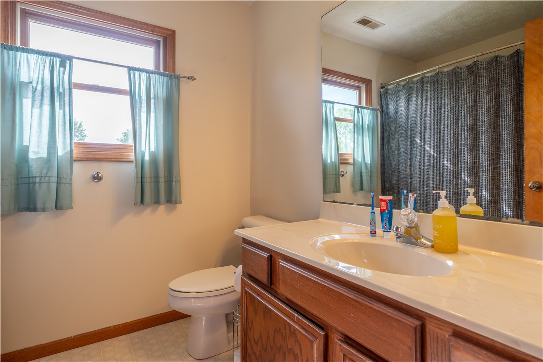 3628 Petre Road Springfield, OH 45502 - Photo 27 of 52 This bright bathroom features a spacious vanity with ample counter space and a large mirror.