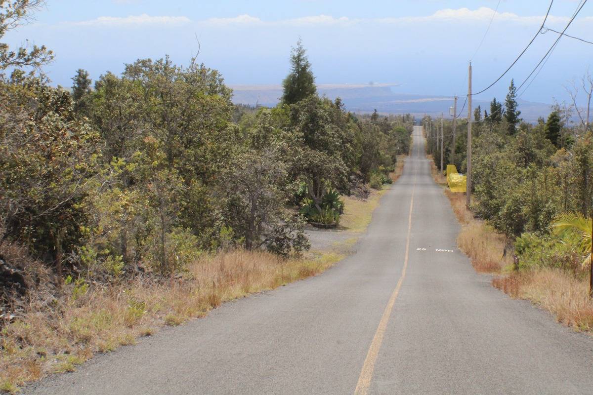 14 Bamboo Lane Ocean View, HI 96704 - Photo 16 of 17 a view of a pathway with a wrought fence