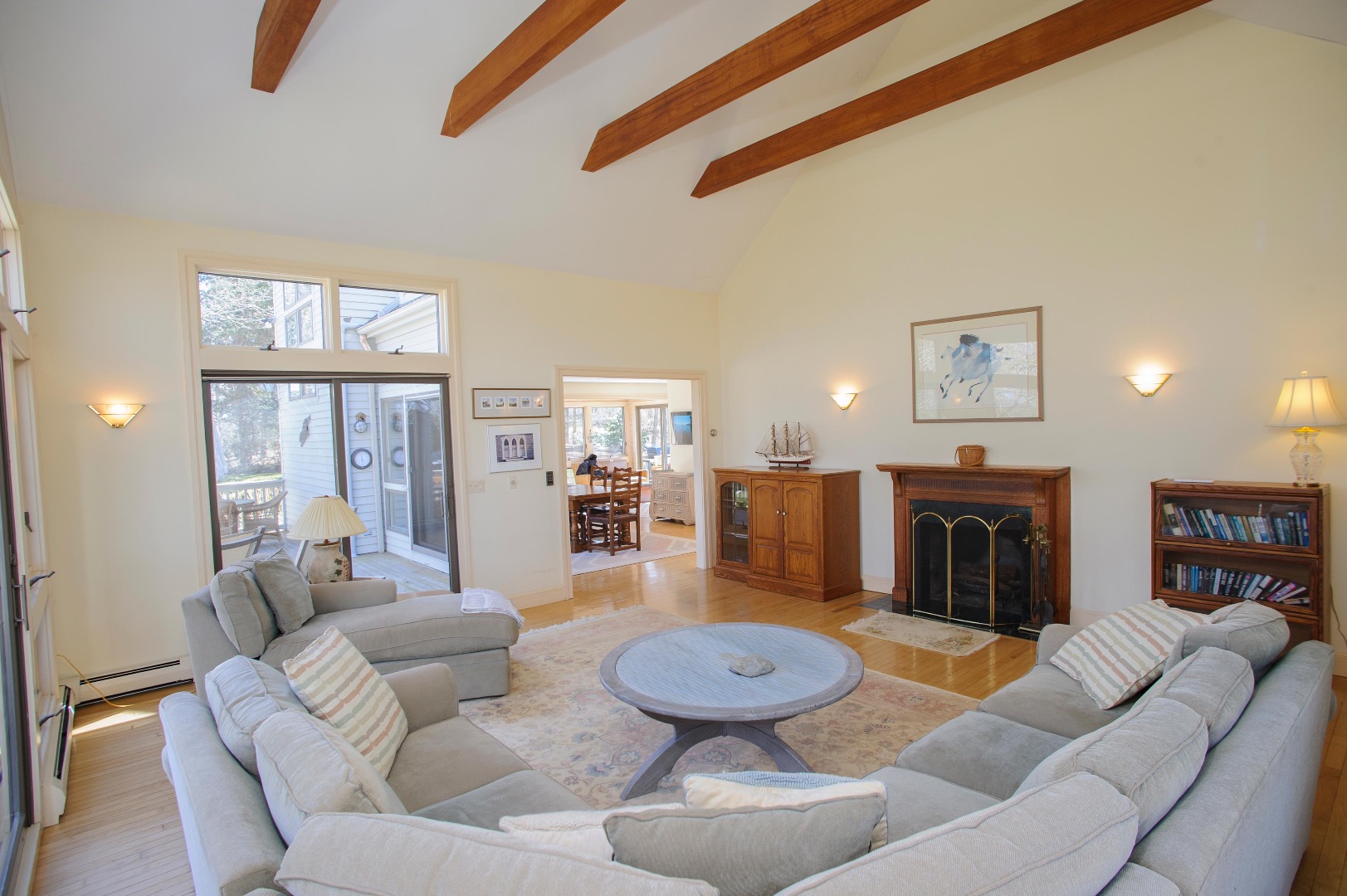 237 Lagoon Pond Road Vineyard Haven, MA 02568 - Photo 6 of 21 a living room with furniture and a fireplace