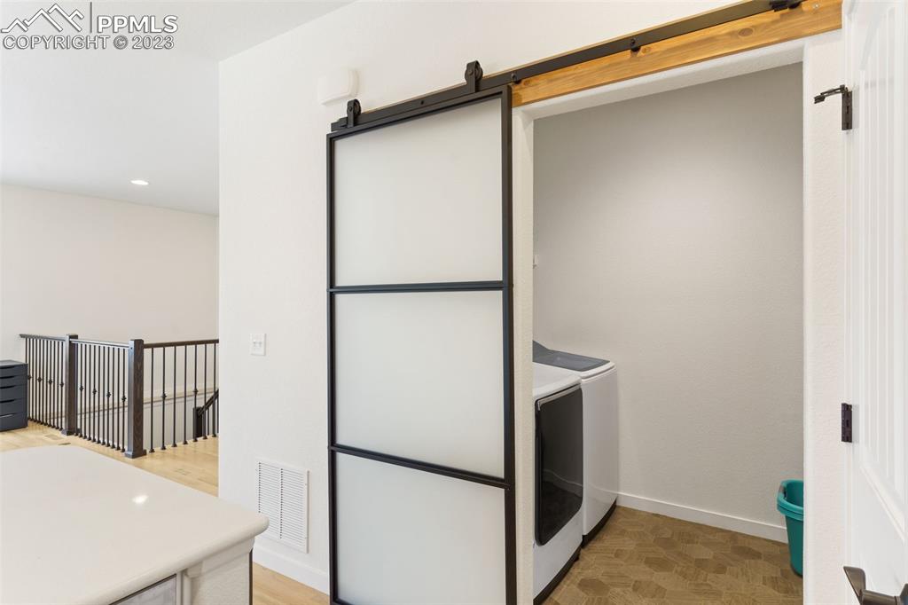 11969 Alydar Loop Colorado Springs, CO 80921 - Photo 35 of 44 a bathroom with a shower and a tub