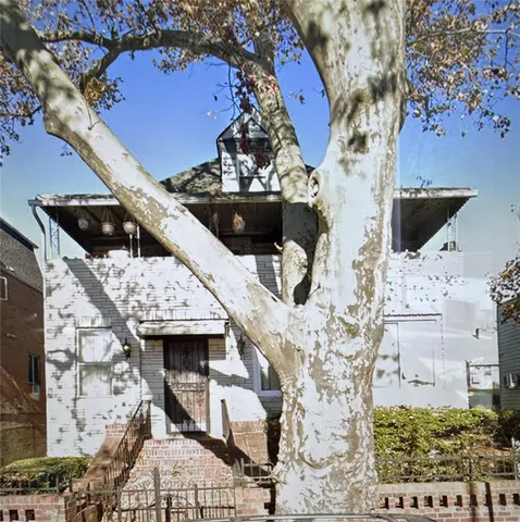a view of house with wooden floor