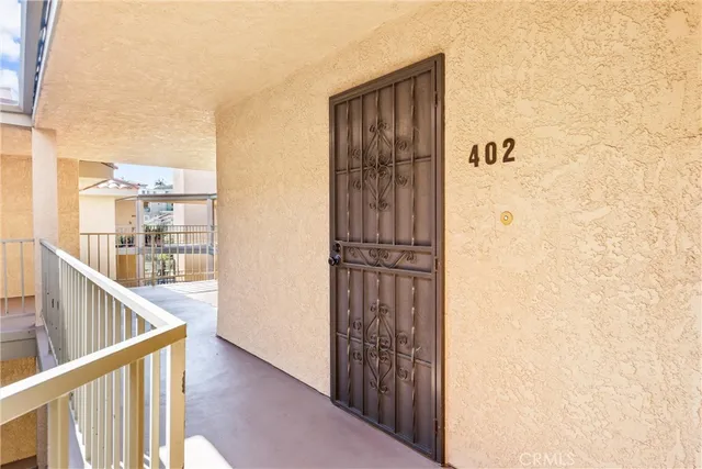 a view of a balcony and an entryway