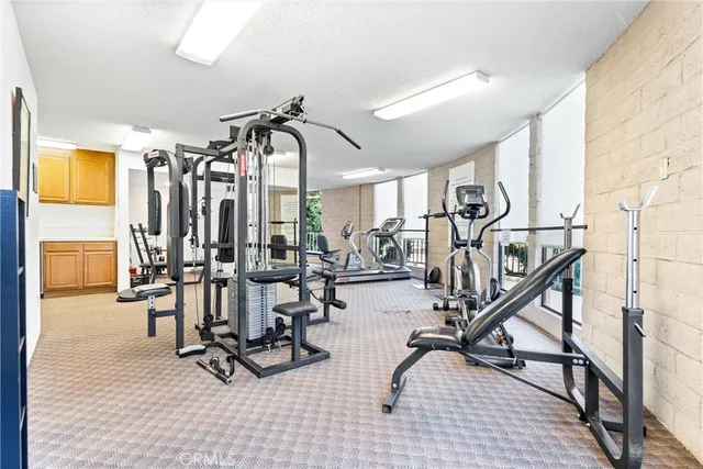 a view of a swimming pool with outdoor seating