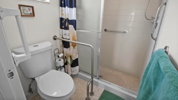 a bathroom with a sink and toilet