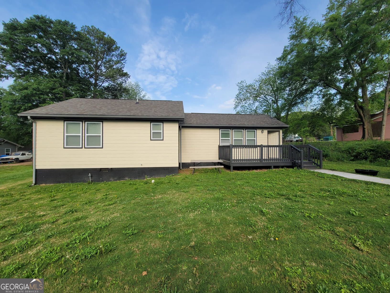 1559 Alma Street Southwest Atlanta, GA 30311 - Photo 2 of 7 a view of a house with backyard and garden