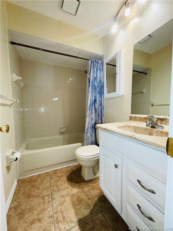 2010 Southwest Beauregard Street Port St. Lucie, FL 34953 - Photo 9 of 10 a bathroom with a sink a toilet and a bathtub