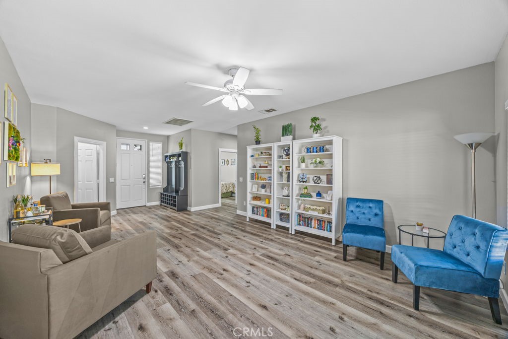 1251 Stepstone Court Hemet, CA 92545 - Photo 17 of 51 a living room with furniture and a wooden floor