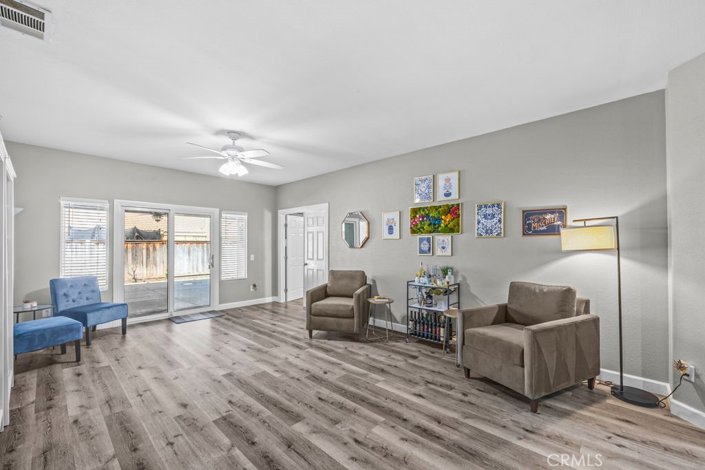 1251 Stepstone Court Hemet, CA 92545 - Photo 20 of 51 a living room with furniture and a large window