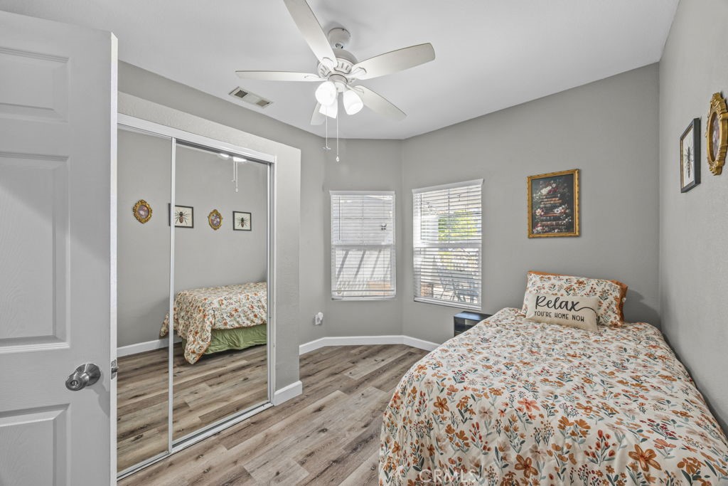 1251 Stepstone Court Hemet, CA 92545 - Photo 34 of 51 a bedroom with a bed and a window
