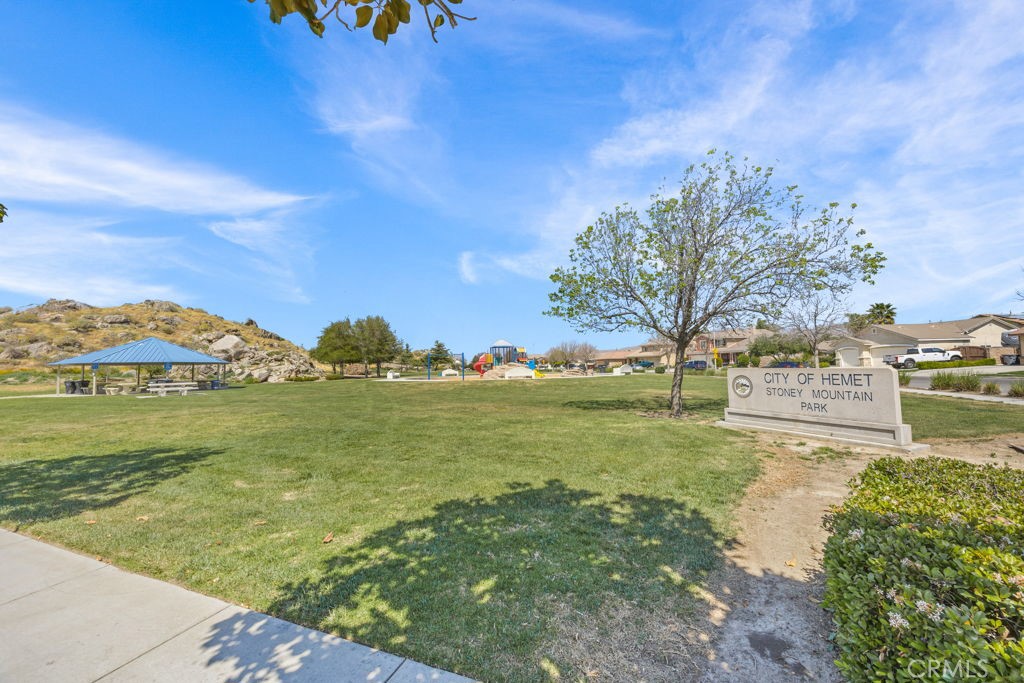 1251 Stepstone Court Hemet, CA 92545 - Photo 42 of 51 a view of a lake with a big yard