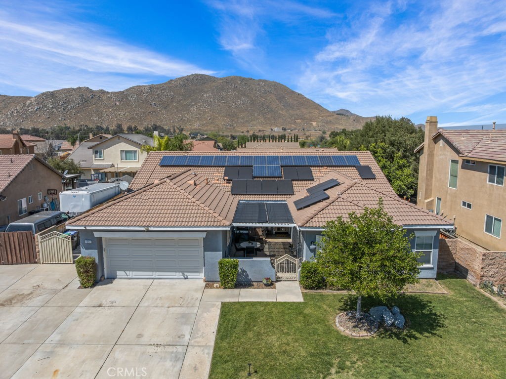1251 Stepstone Court Hemet, CA 92545 - Photo 46 of 51 a front view of a house with a yard