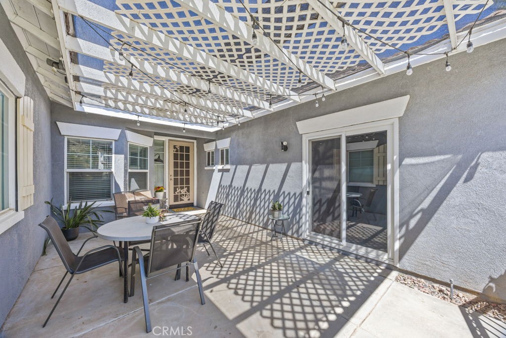 1251 Stepstone Court Hemet, CA 92545 - Photo 5 of 51 a view of a chairs and table in the patio