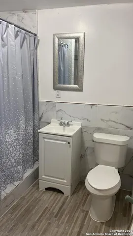 a view of a yard with an ocean view