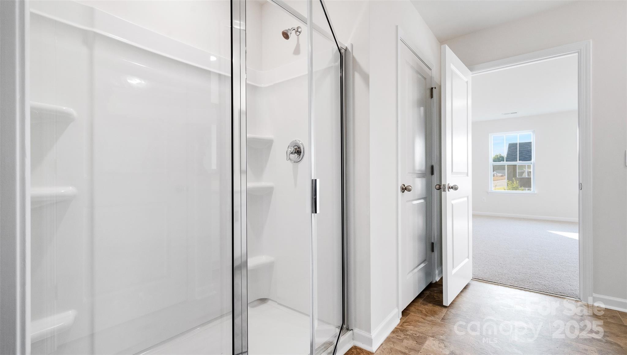 22 Callie River Clyde, NC 28721 - Photo 23 of 23 a bathroom with a shower and a glass door