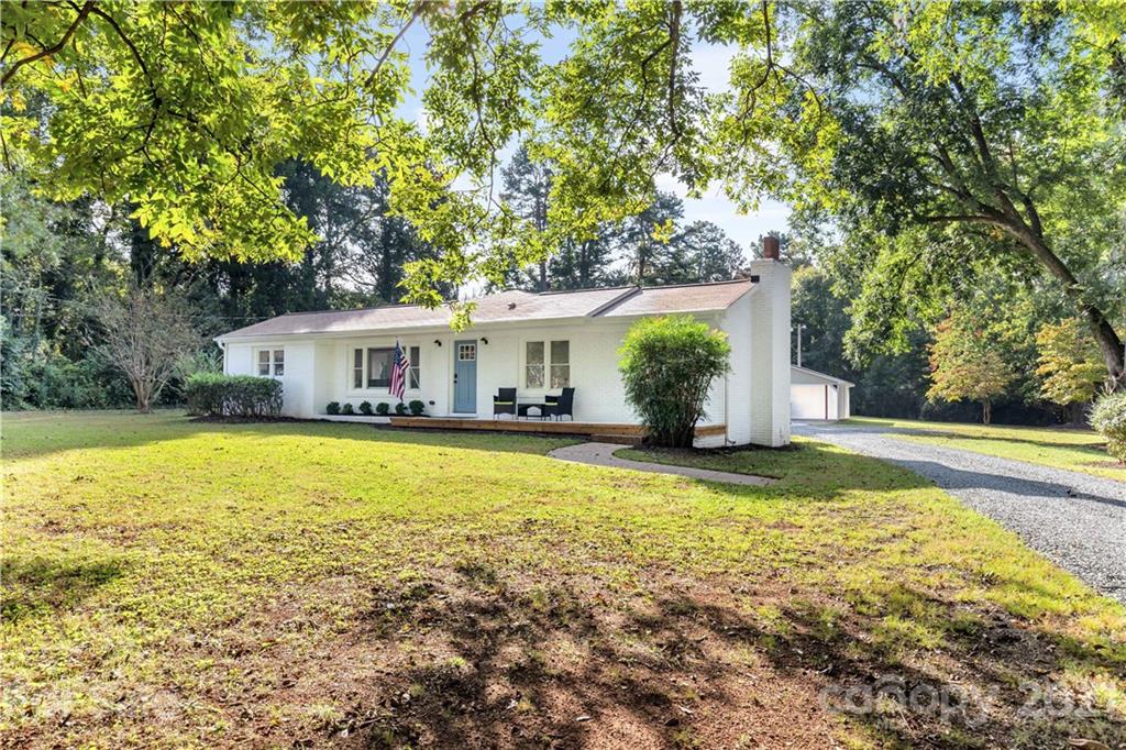 2616 Williams Road Matthews, NC 28105 - Photo 1 of 26 a front view of house with yard having outdoor seating