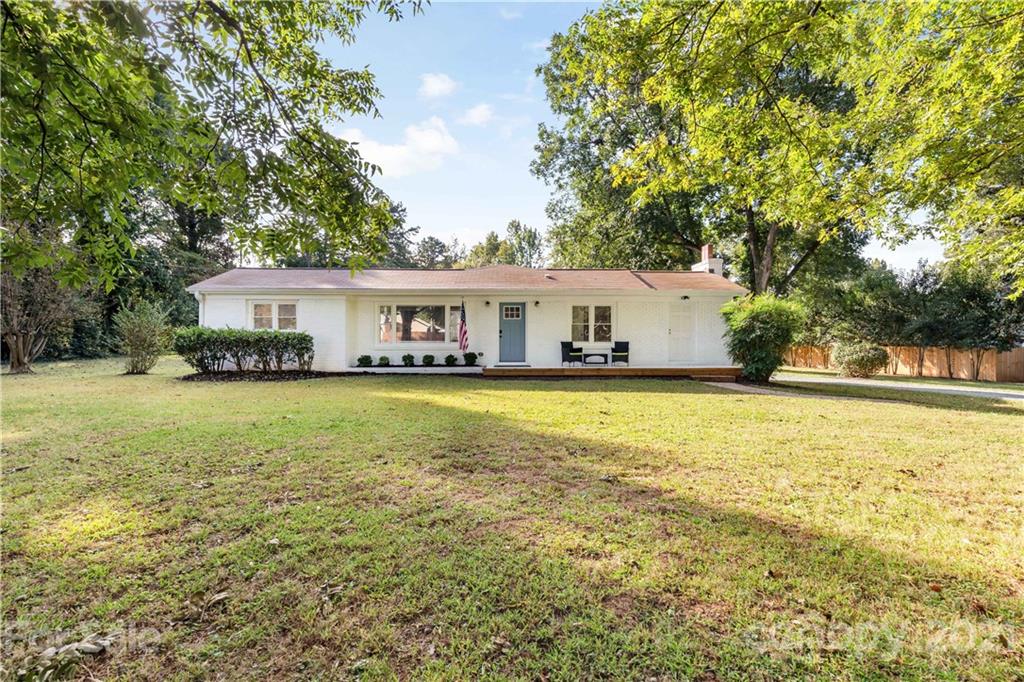 2616 Williams Road Matthews, NC 28105 - Photo 2 of 26 a view of a house with a swimming pool