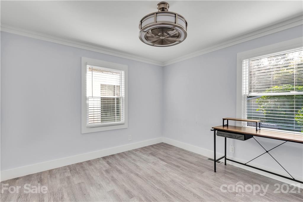 2616 Williams Road Matthews, NC 28105 - Photo 19 of 26 a view of a room with wooden floor and windows
