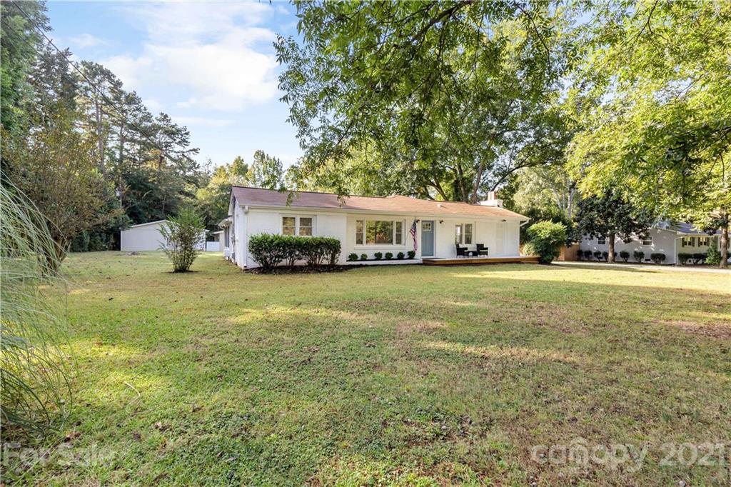 2616 Williams Road Matthews, NC 28105 - Photo 3 of 26 a front view of a house with a yard