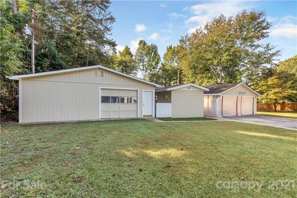 2616 Williams Road Matthews, NC 28105 - Photo 25 of 26 a house that has a tree in front of it