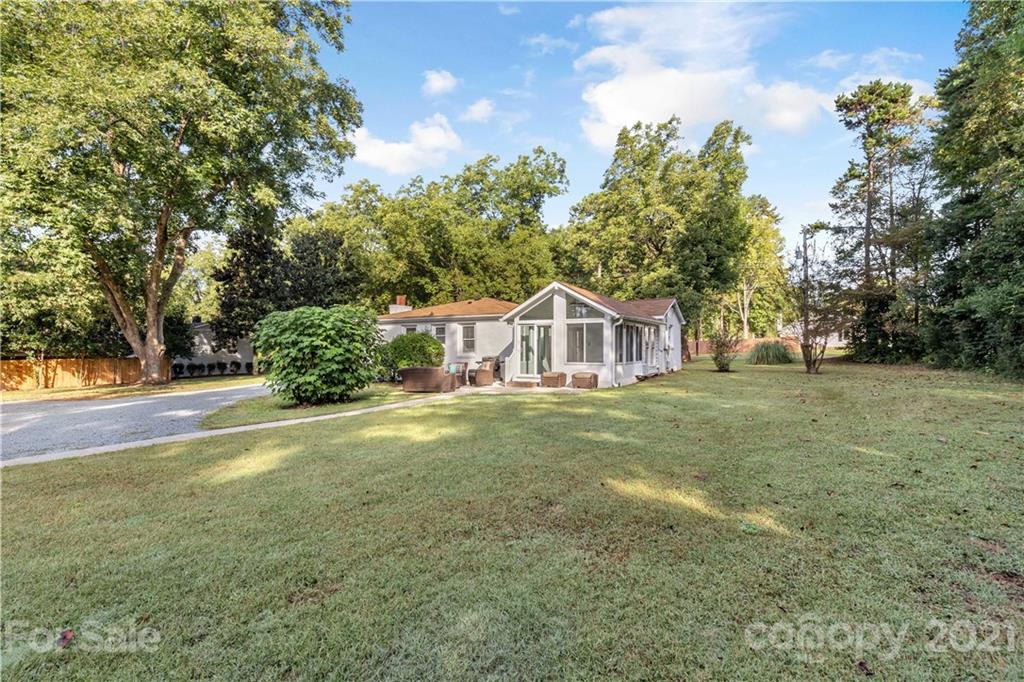 2616 Williams Road Matthews, NC 28105 - Photo 5 of 26 a front view of a house with yard and green space
