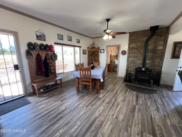 a kitchen with stainless steel appliances granite countertop a stove a sink dishwasher and a refrigerator