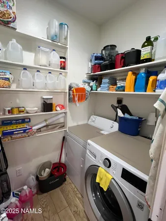 a view of a yard with trees in the background