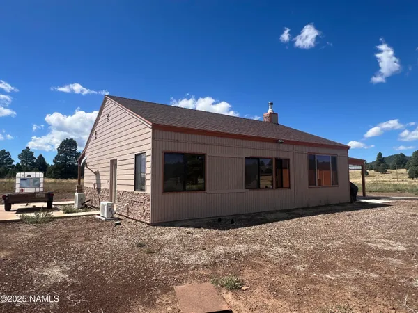 a house view with a sitting space