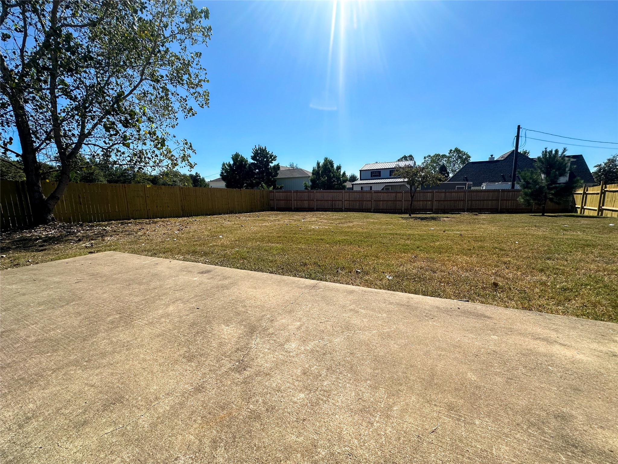 237 Cardinal Drive Paige, TX 78659 - Photo 30 of 37 Fenced backyard featuring a patio