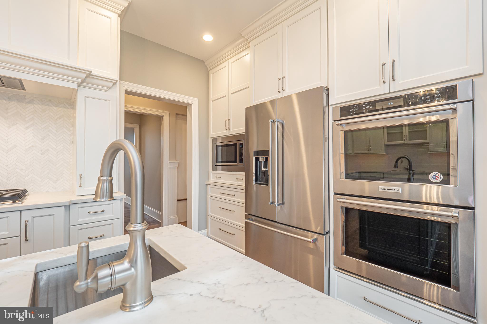 Lot C Howell Road Malvern, PA 19355 - Photo 21 of 61 a kitchen with stainless steel appliances a refrigerator stove and cabinets