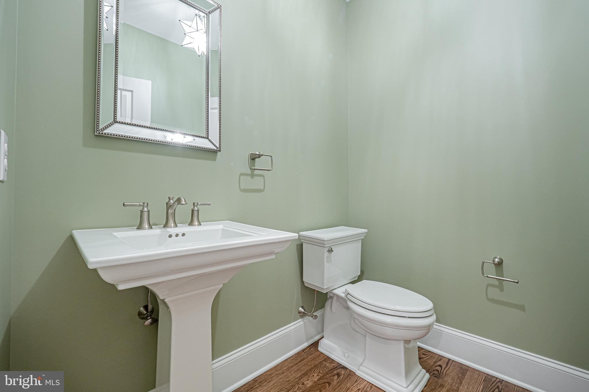Lot C Howell Road Malvern, PA 19355 - Photo 32 of 61 a white toilet sitting next to a bathroom sink