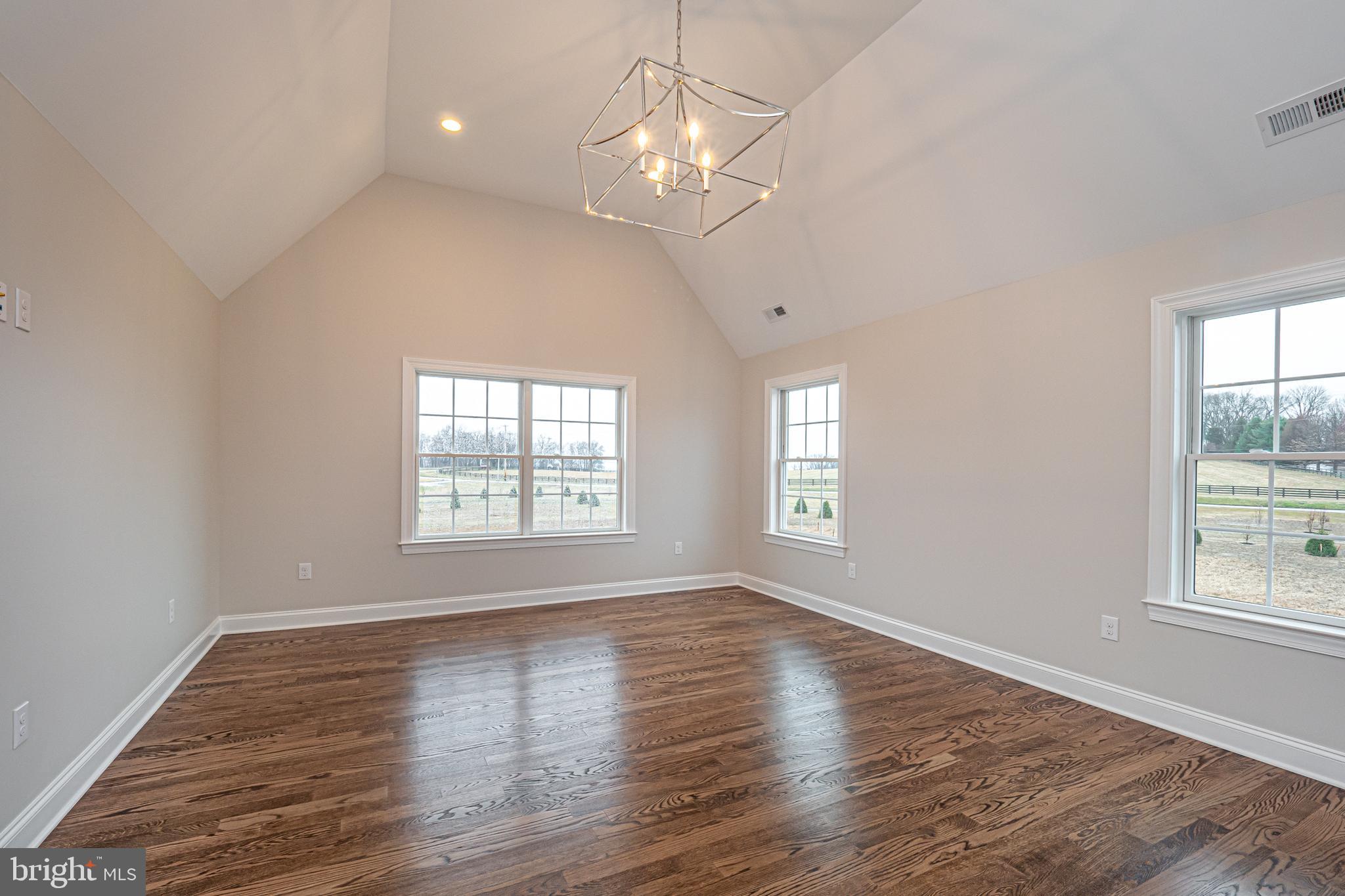 Lot C Howell Road Malvern, PA 19355 - Photo 35 of 61 a view of an empty room with wooden floor and a window