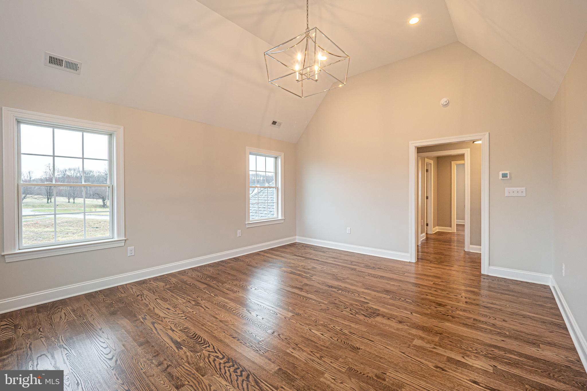 Lot C Howell Road Malvern, PA 19355 - Photo 36 of 61 a view of an empty room with wooden floor and a window