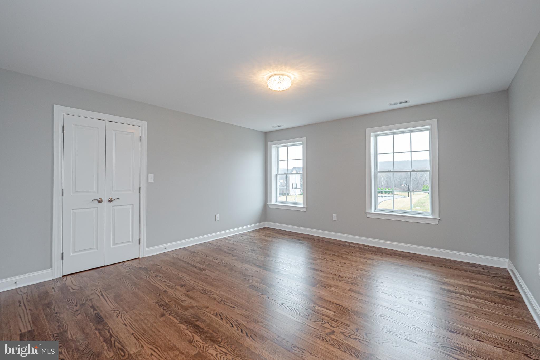 Lot C Howell Road Malvern, PA 19355 - Photo 46 of 61 a view of an empty room with wooden floor and window