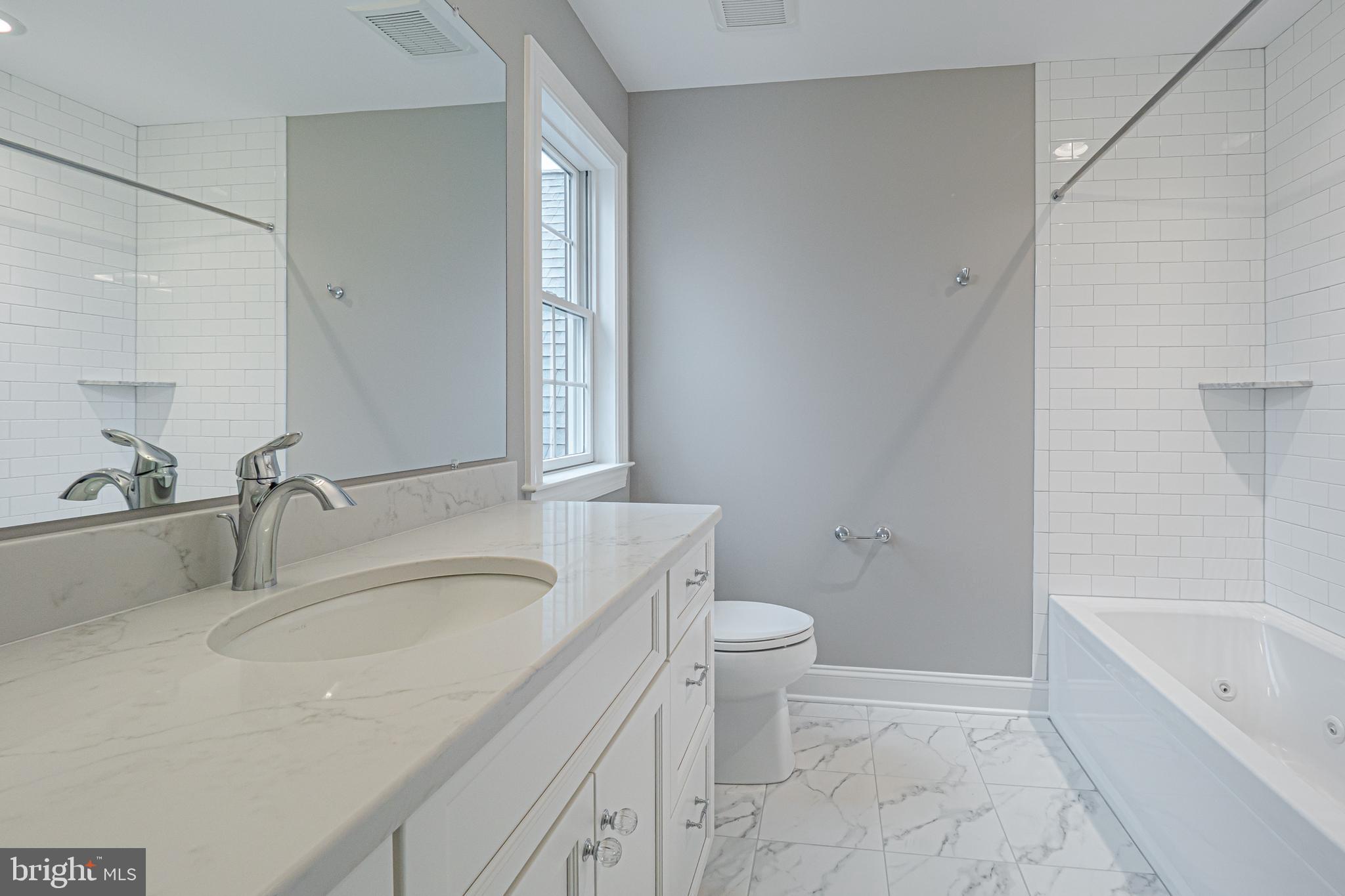 Lot C Howell Road Malvern, PA 19355 - Photo 48 of 61 a bathroom with a granite countertop sink a toilet and bathtub