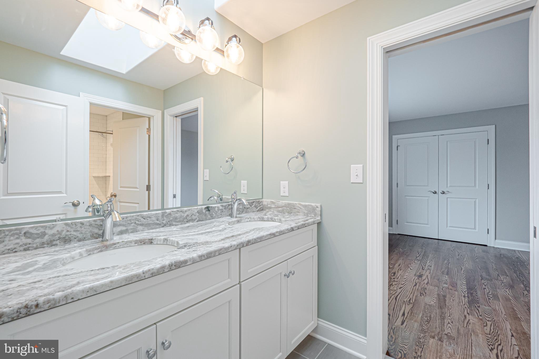 Lot C Howell Road Malvern, PA 19355 - Photo 51 of 61 a bathroom with a granite countertop double vanity sink and mirror
