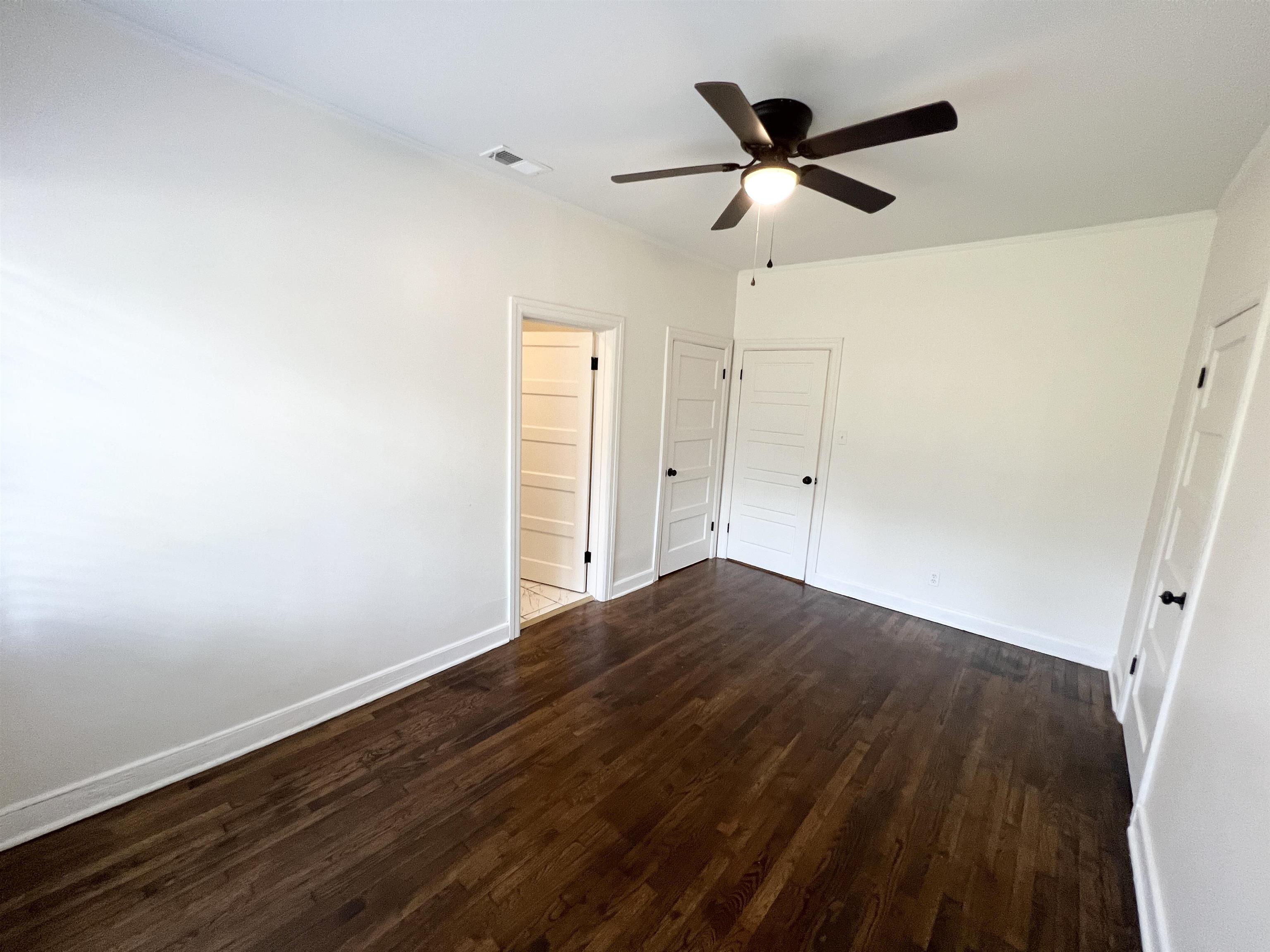 105 West Peebles Road Memphis, TN 38109 - Photo 8 of 15 wooden floor in an empty room